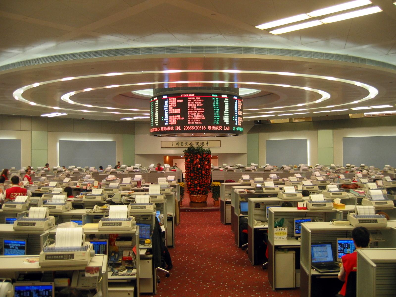 a large group of people sitting at desks - File:Hong Kong Exchange Trade Lobby 2007.jpg